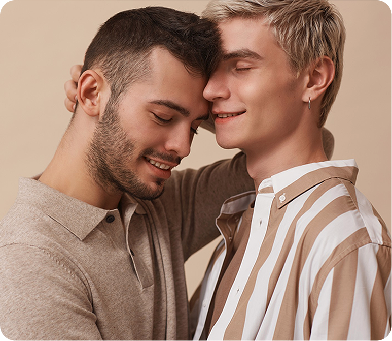 DoubleList graphic of 2 gay men in a close embrace, touching heads and smiling to symbolize gay hookups.